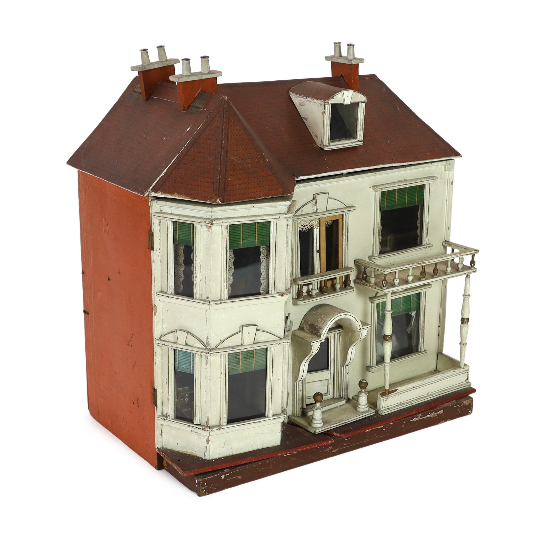 A G. and J. Lines furnished dolls’ house of 'Kits Koty' type, early 20th century, 92cm high.